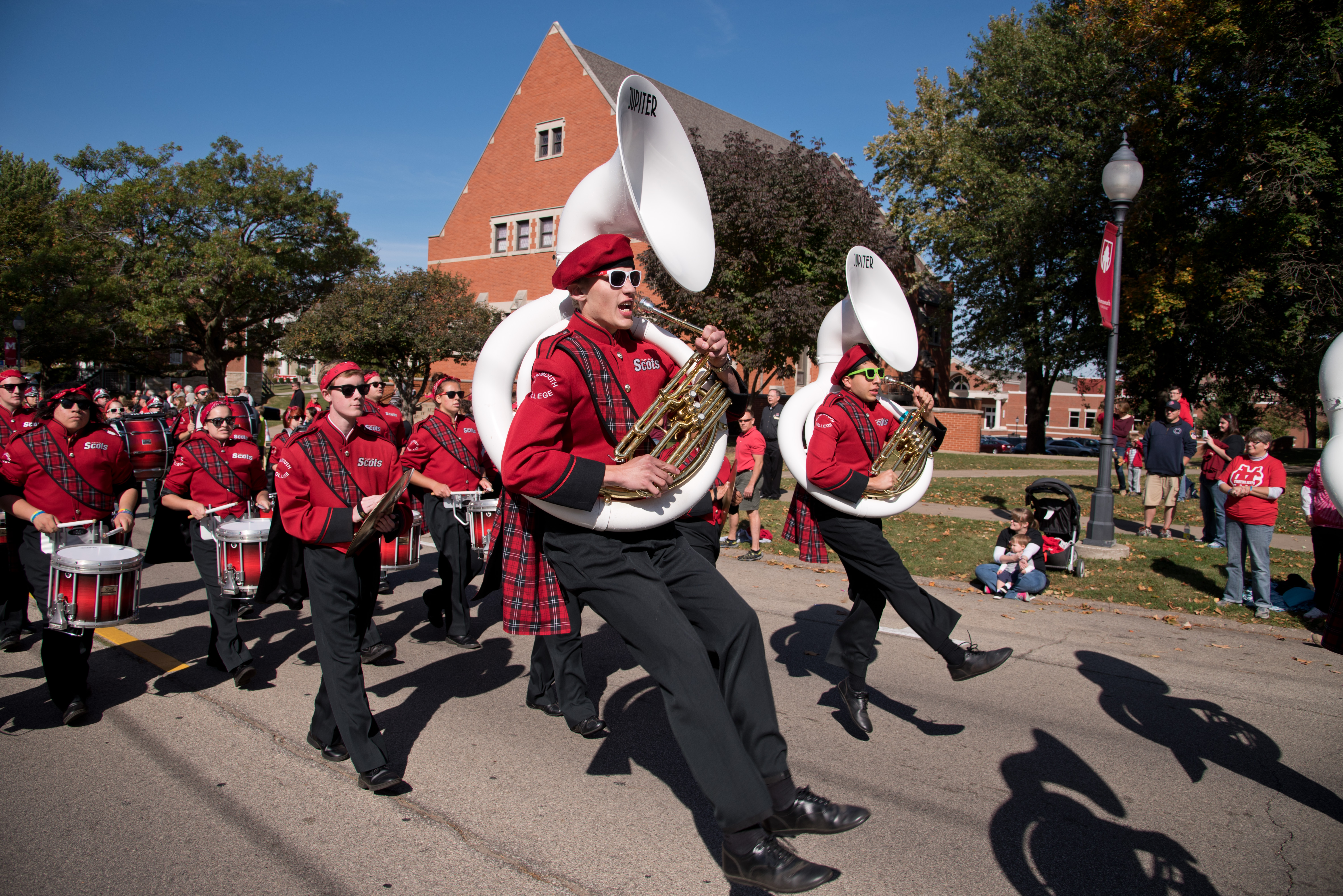 Monmouth College bagpipers leading a campus tradition